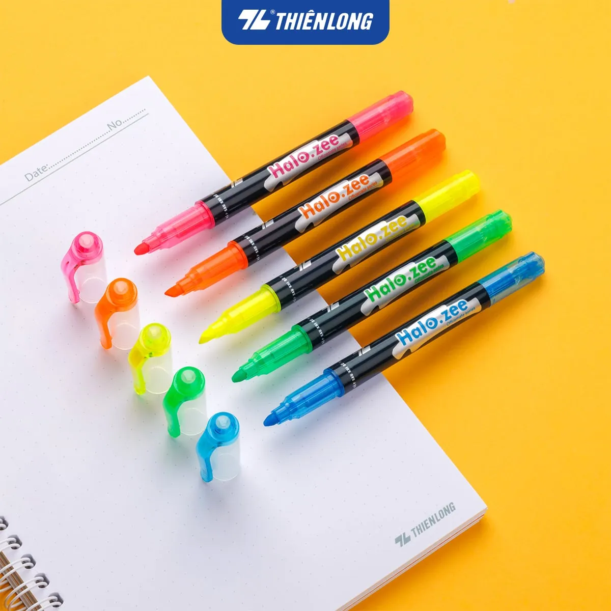 Bộ bút dạ quang Thiên Long Halo.zee nhiều màu sắc tươi sáng đặt trên trang giấy ghi chú nền vàng nổi bật